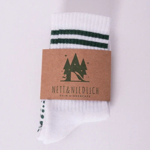 Die Socke fertig verpackt mit Banderole